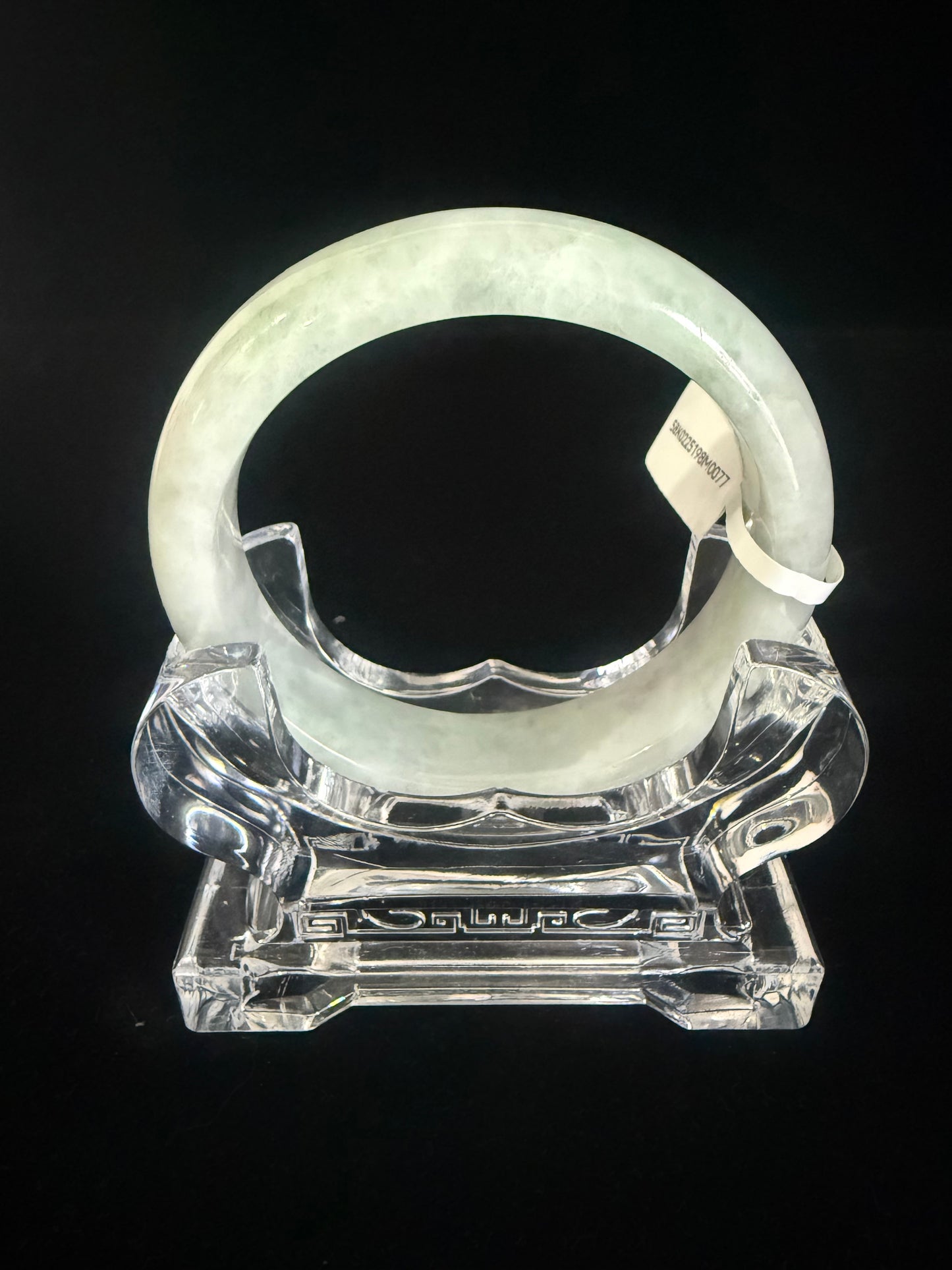 77. Light weight green with soft cotton Jade bangle