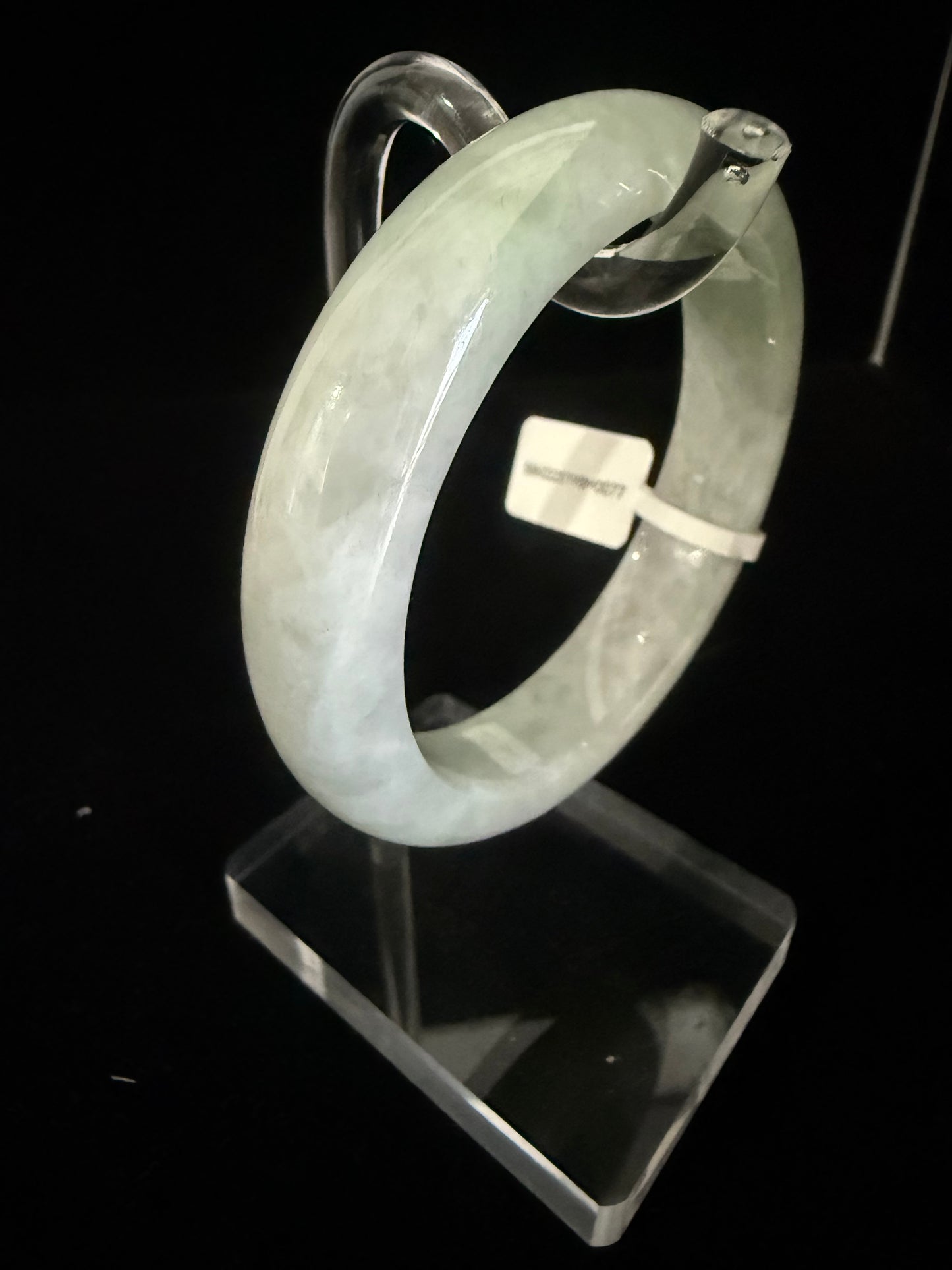 77. Light weight green with soft cotton Jade bangle