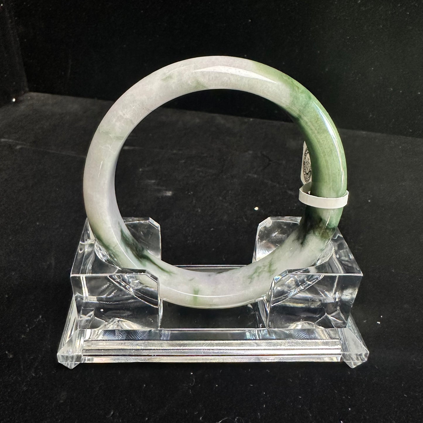 20. White with Touches of Dark Green Jade Bangle