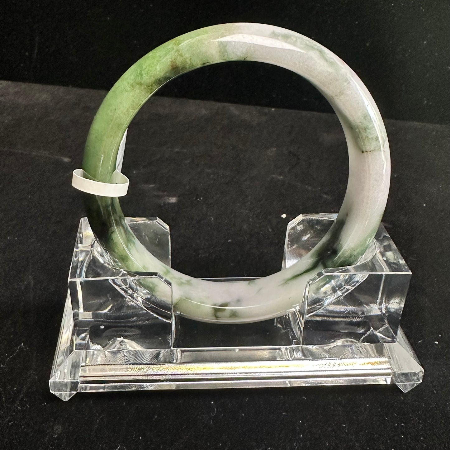 20. White with Touches of Dark Green Jade Bangle