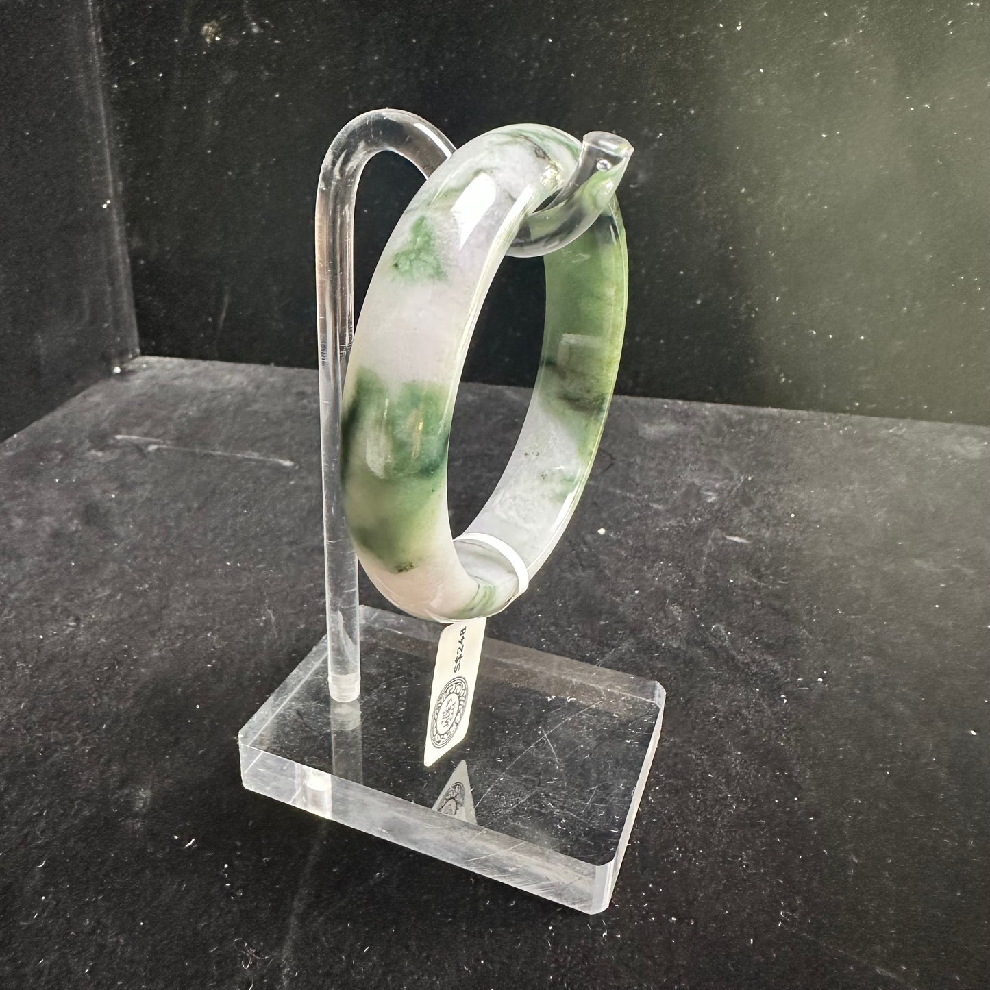20. White with Touches of Dark Green Jade Bangle