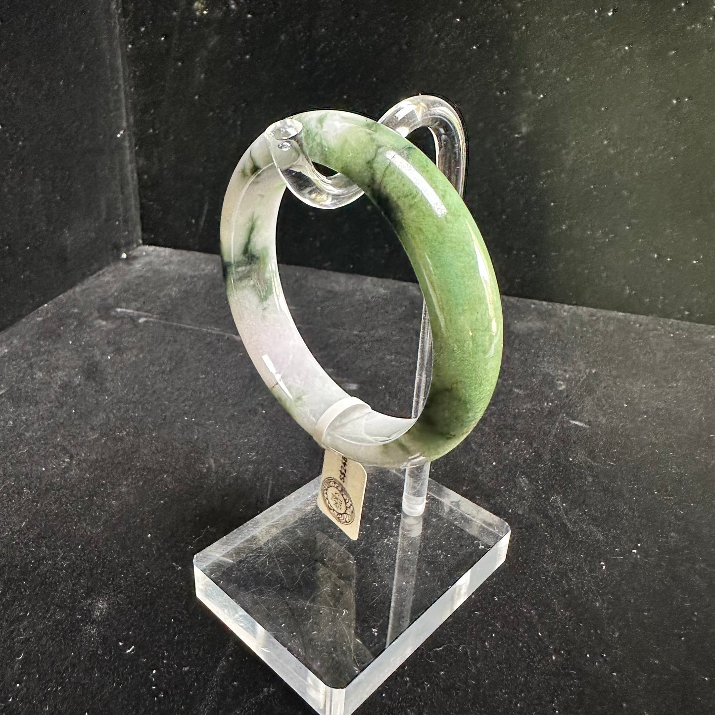 20. White with Touches of Dark Green Jade Bangle