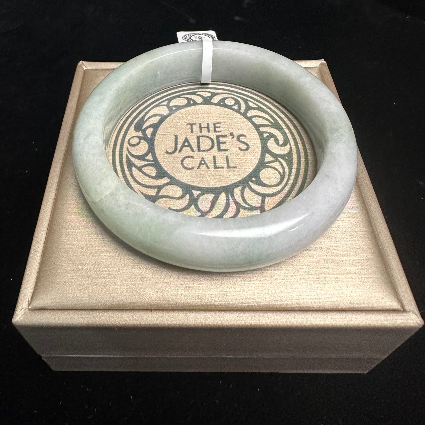 28. Pale Green and White Jade Bangle