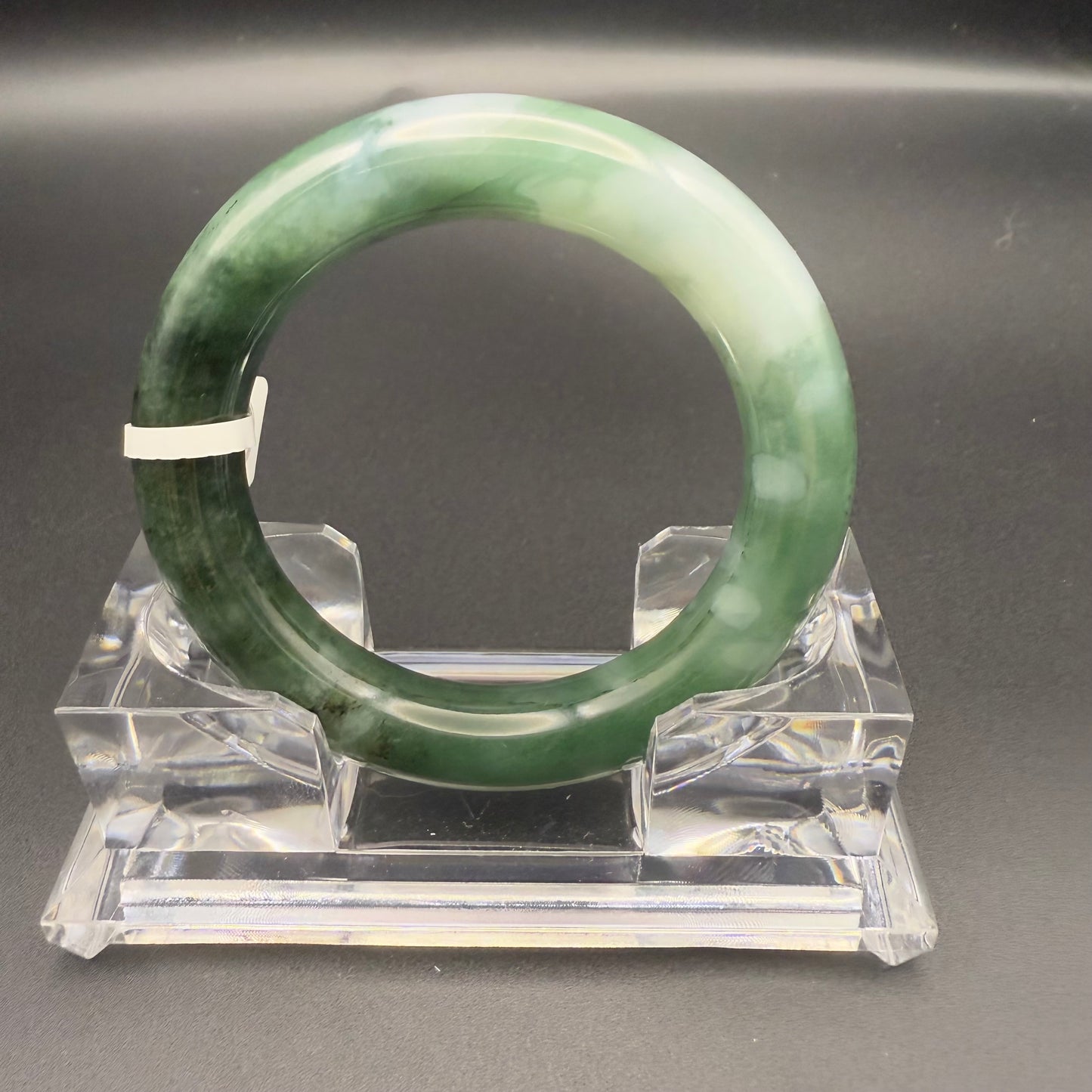 41. Dark green base with white patches jade bangle
