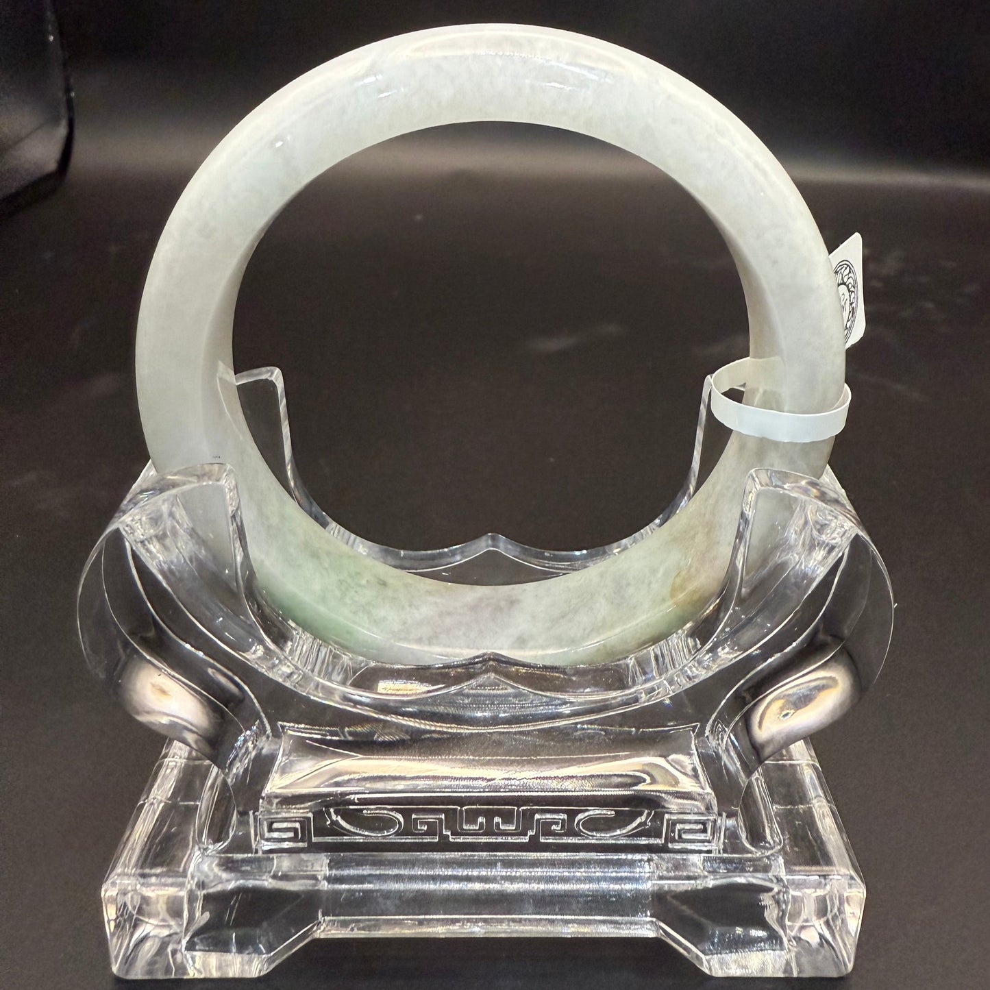 49. Grey with dashes of green jade bangle