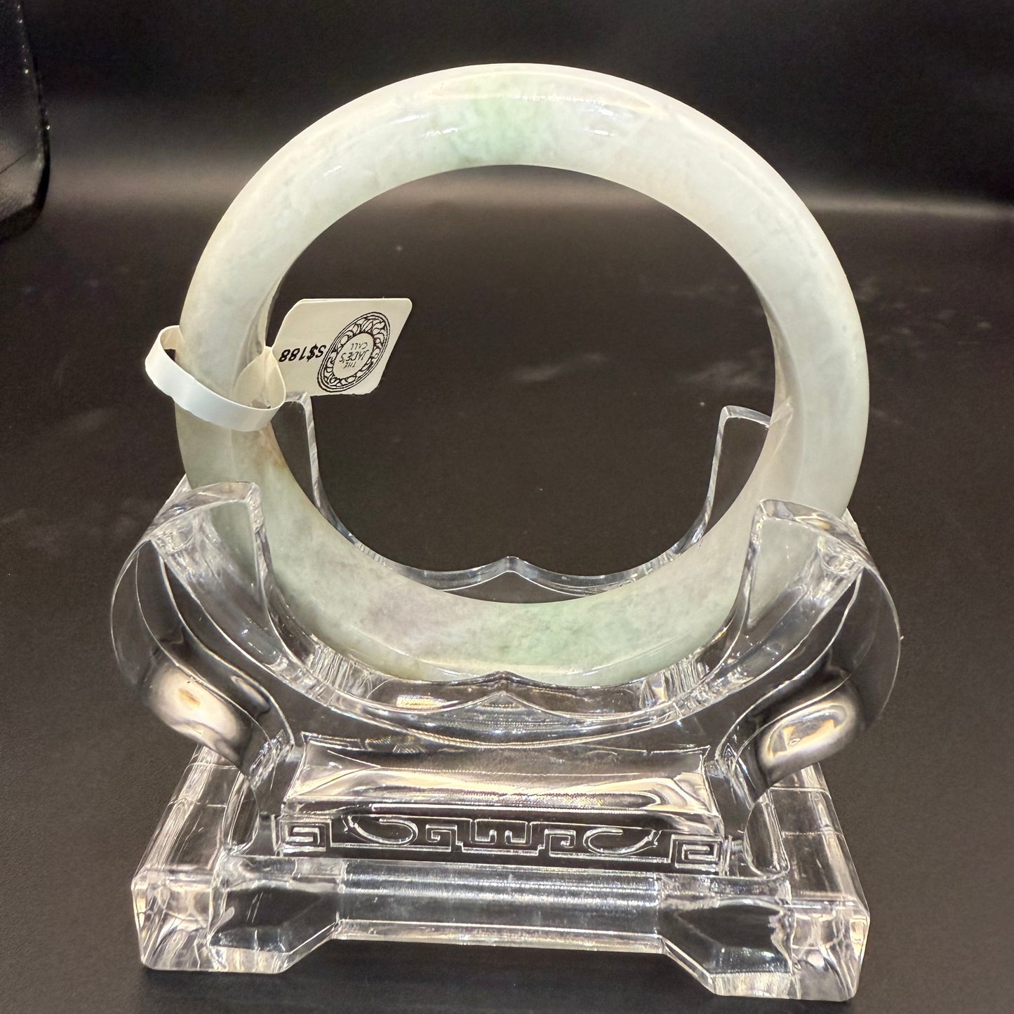 49. Grey with dashes of green jade bangle