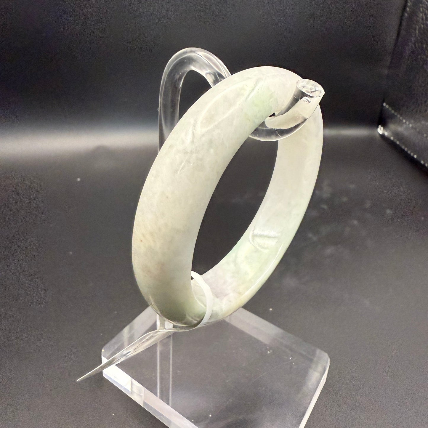 49. Grey with dashes of green jade bangle