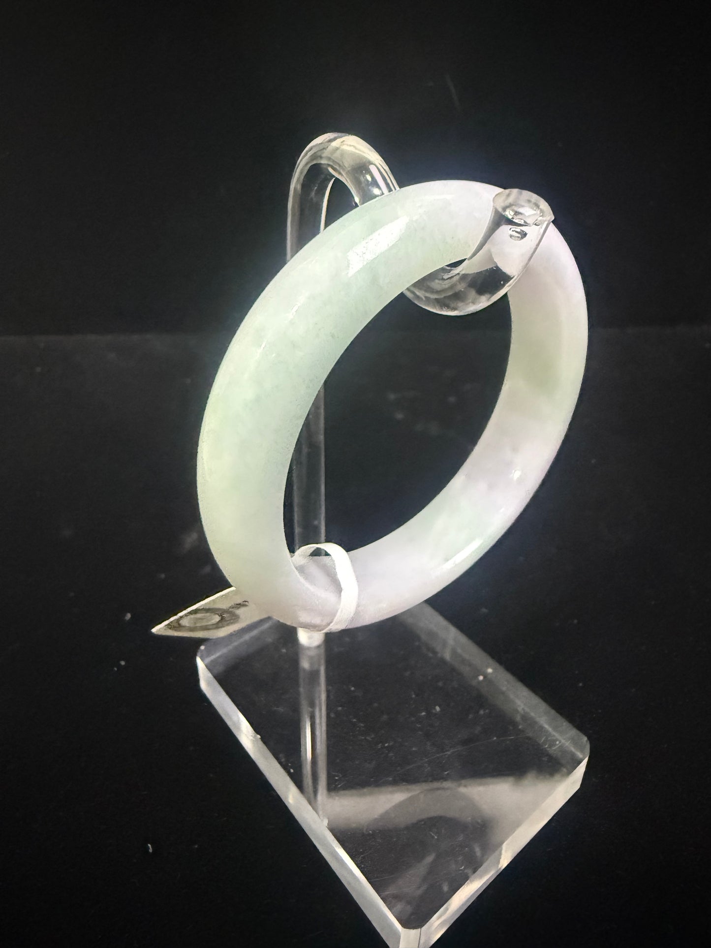 54. A fair green & purple jade bangle