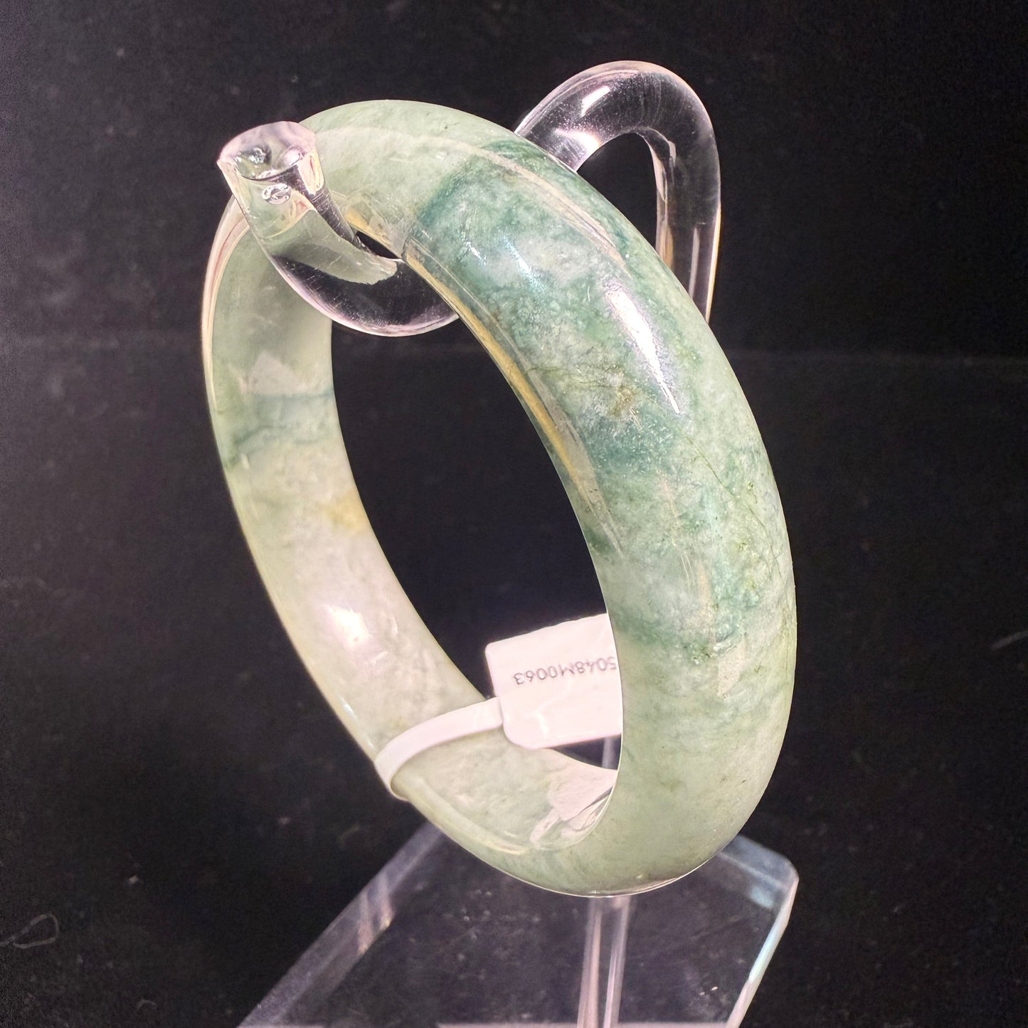 63. Green with green jade bangles