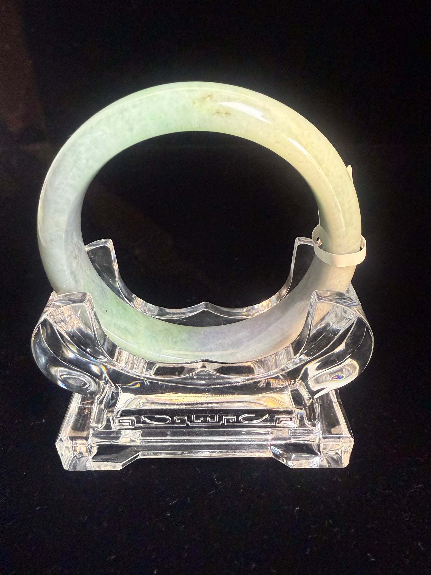 67. Green, purple with a dash of yellow Jade bangle