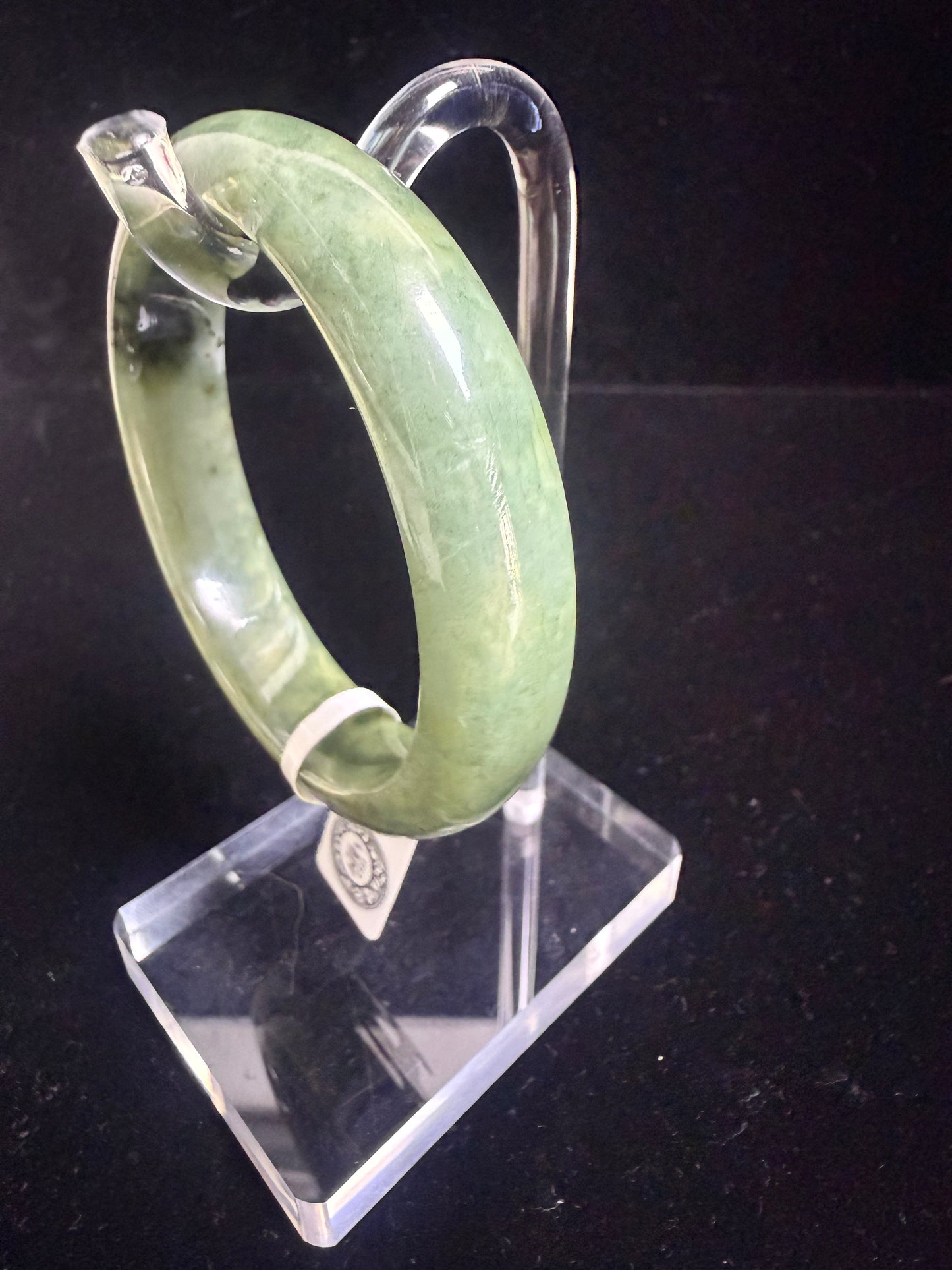 68. Green with natural black speckles jade bangle
