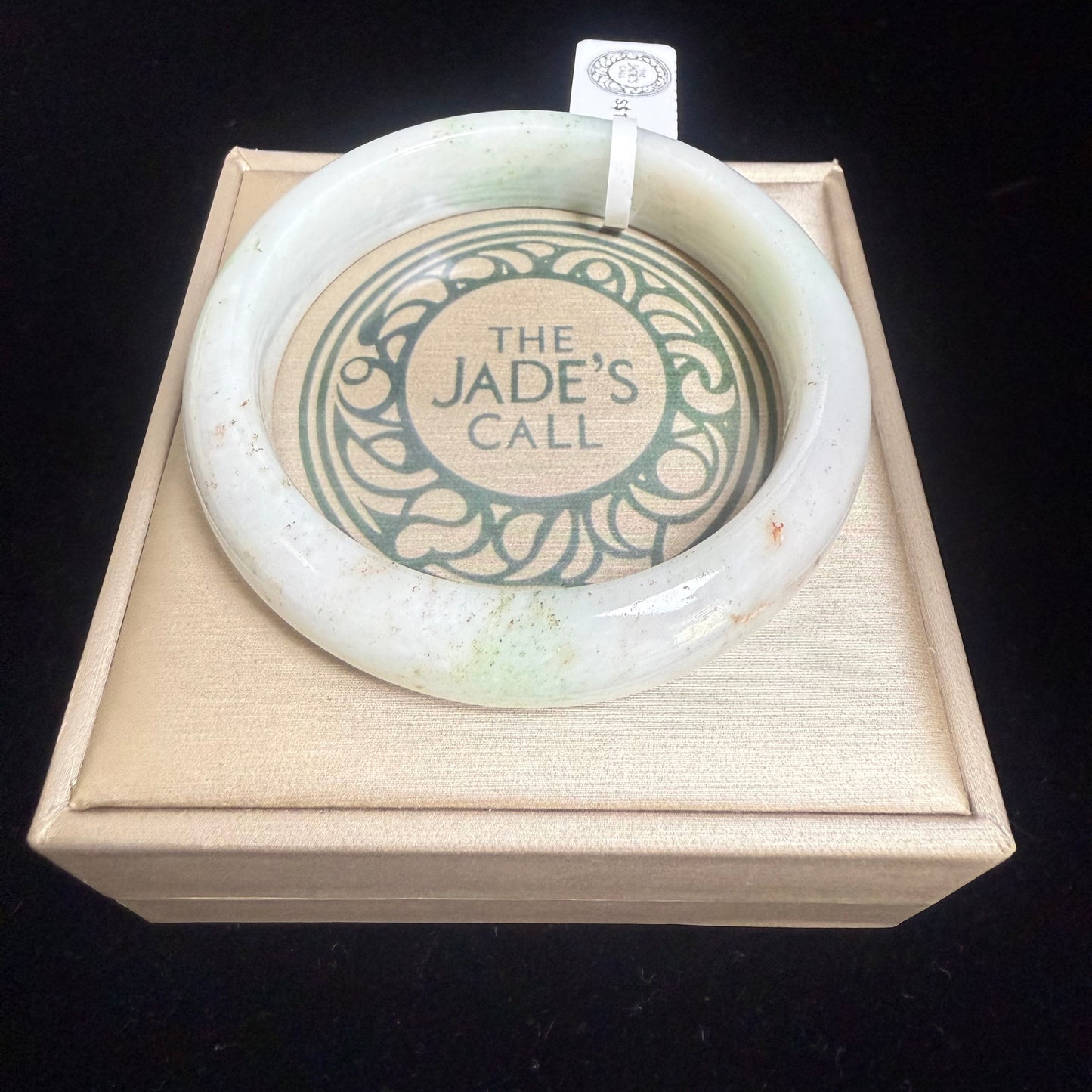 70. Light tint with gold speckles Jade bangle