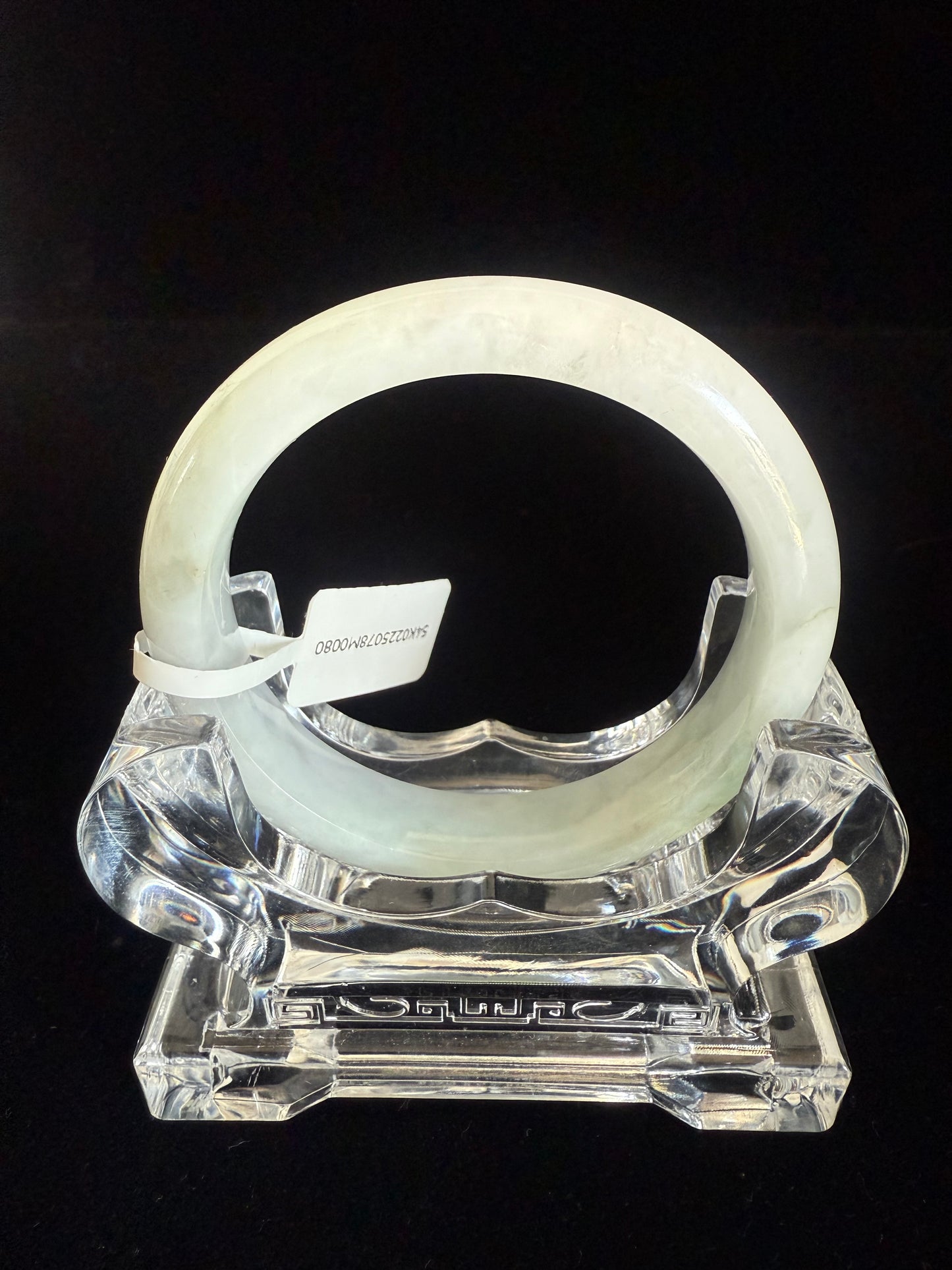 80. White with hue of green tone Jade bangle