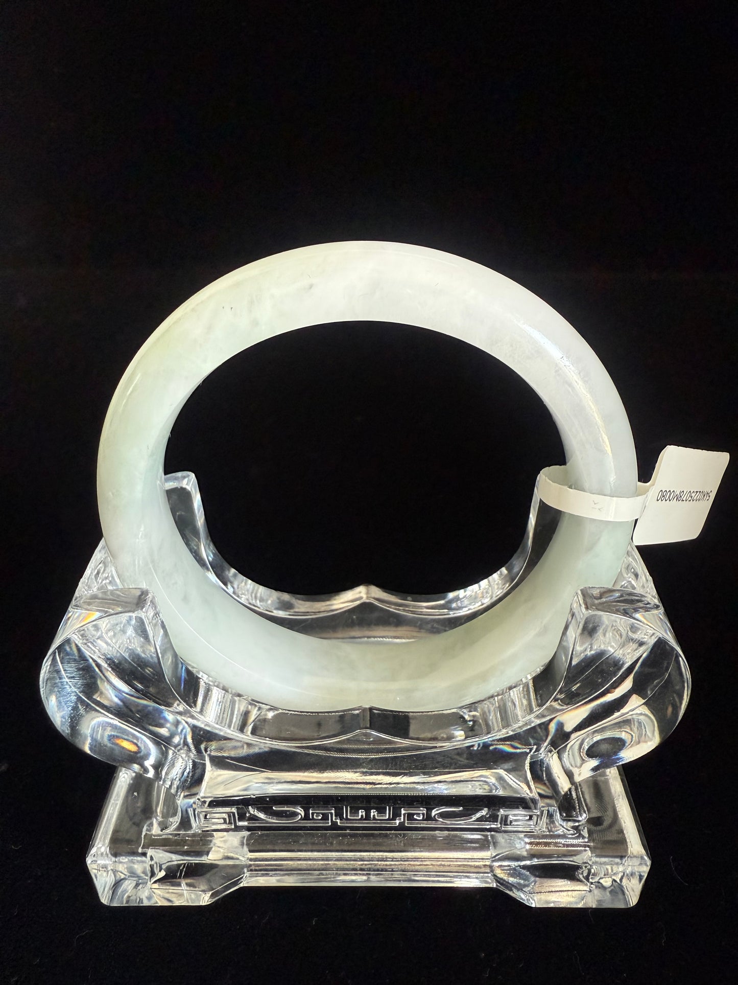 80. White with hue of green tone Jade bangle