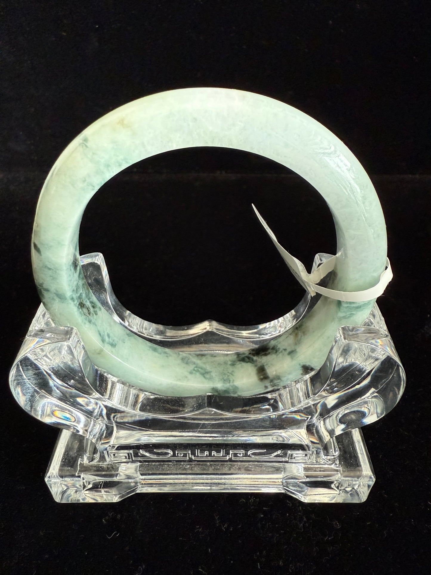 99. Light green with dark brown pattern Jade Bangle.