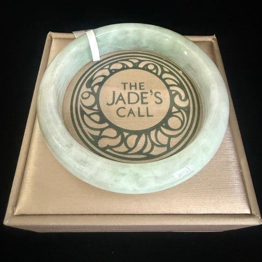 77. Light weight green with soft cotton Jade bangle