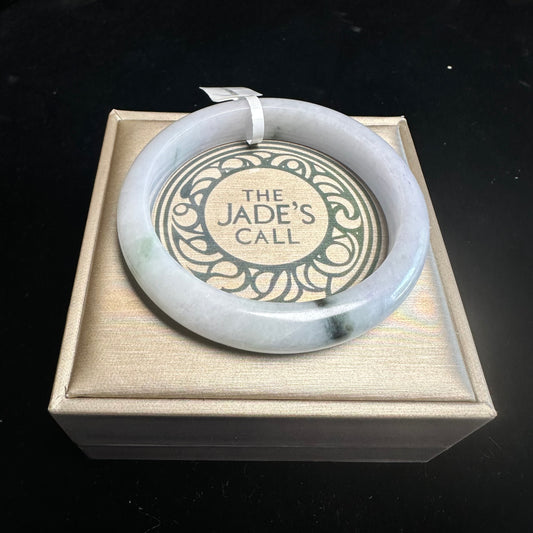 18. White with Touches of Green Jade Bangle