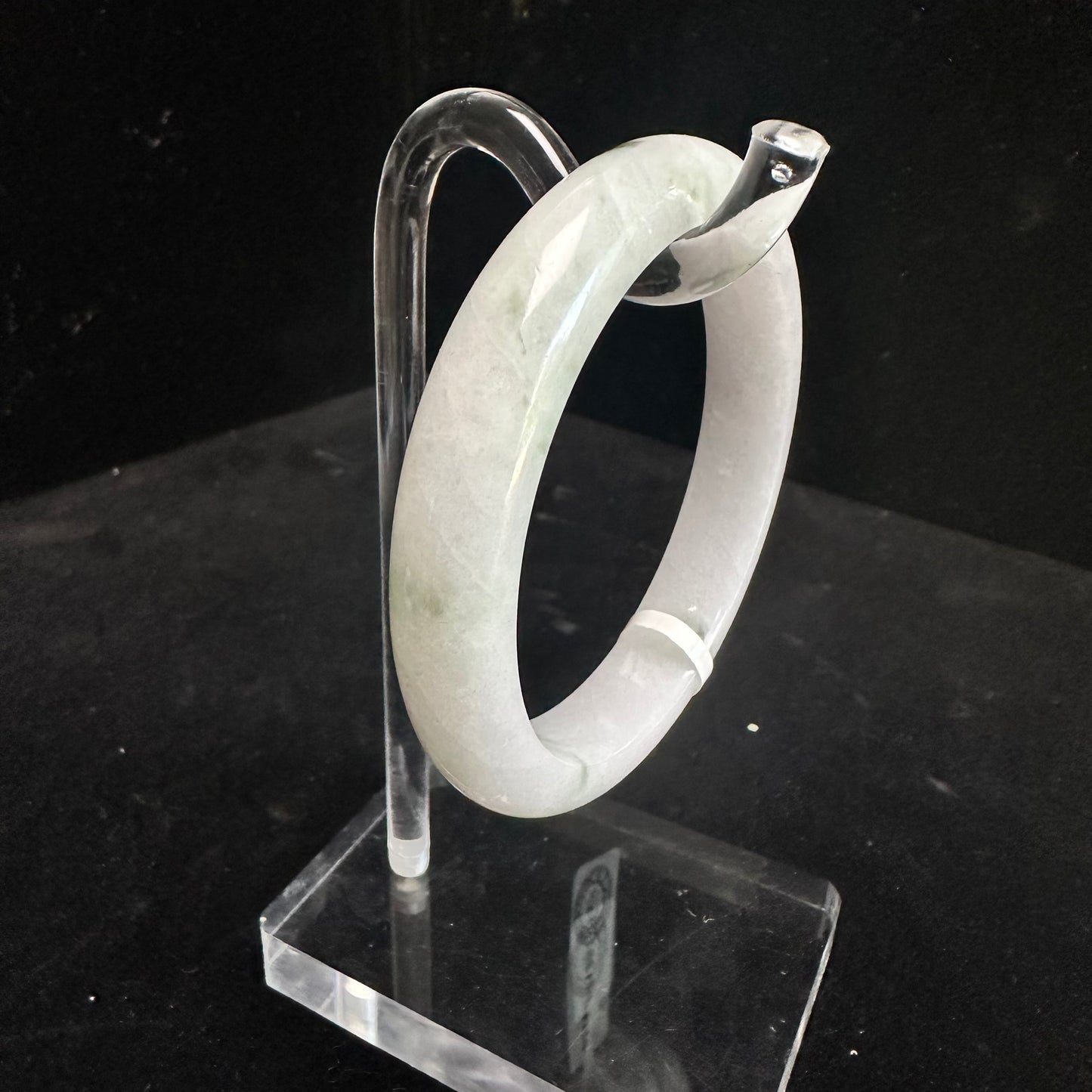 18. White with Touches of Green Jade Bangle