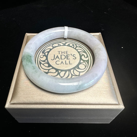 19. White with Touches of Green Jade Bangle