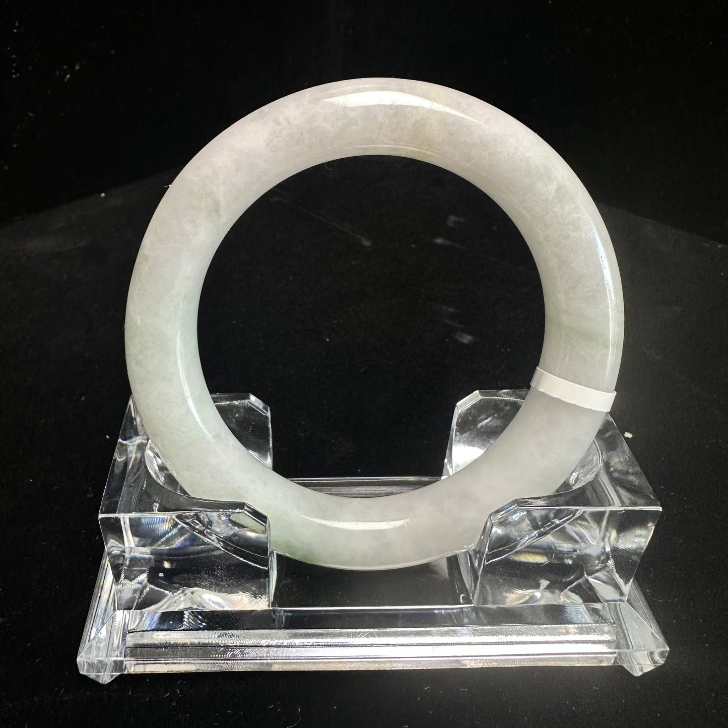 19. White with Touches of Green Jade Bangle