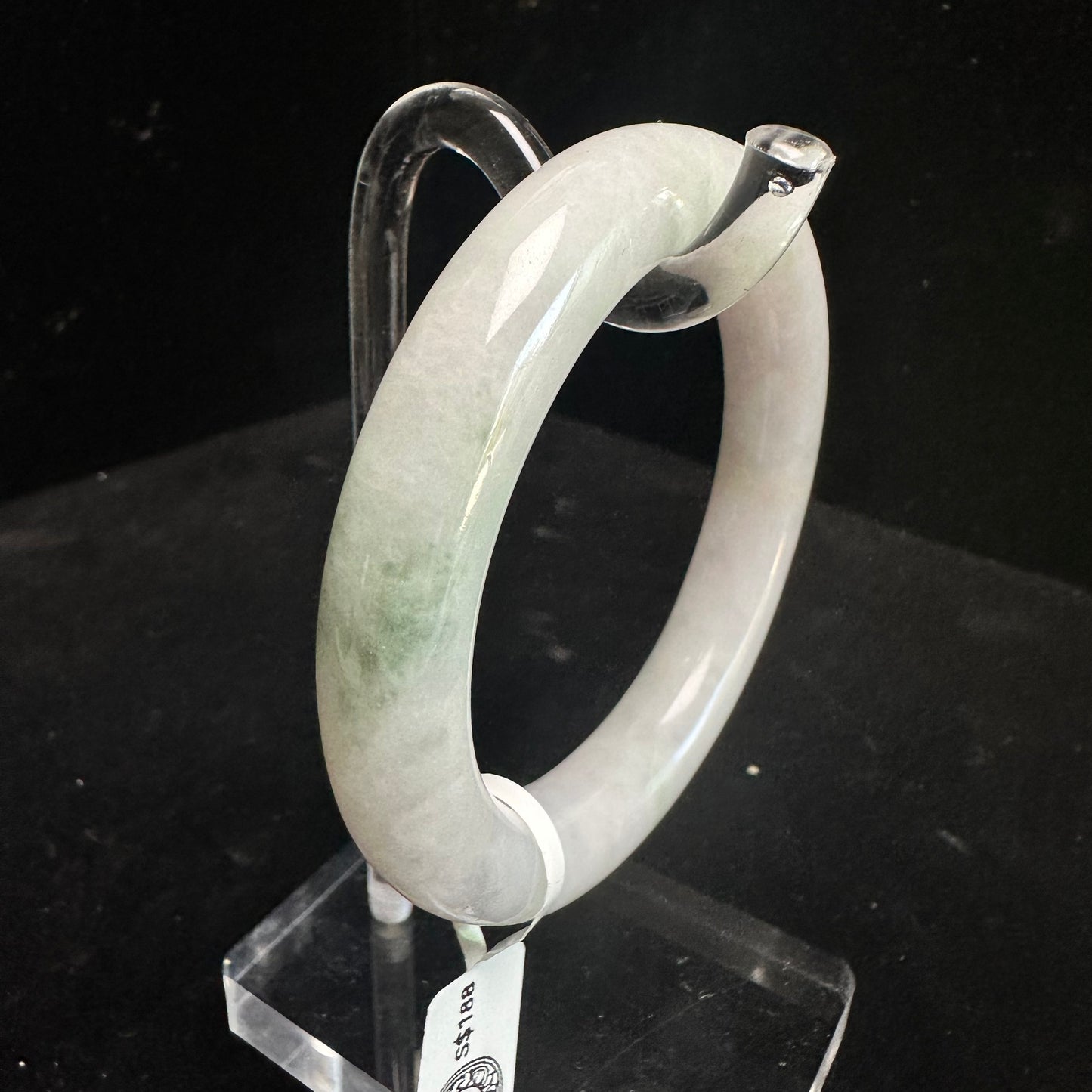 19. White with Touches of Green Jade Bangle