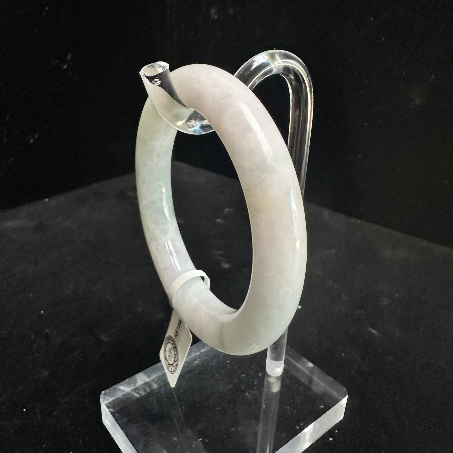 19. White with Touches of Green Jade Bangle