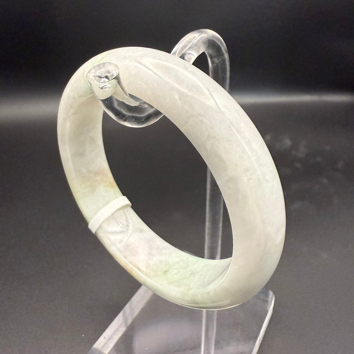 49. Grey with dashes of green jade bangle