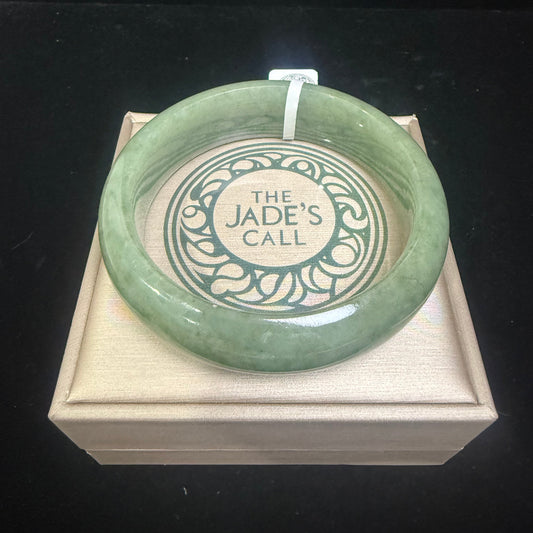 53. Broad flawless lake green Jade bangles