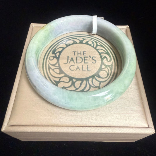 67. Green, purple with a dash of yellow Jade bangle
