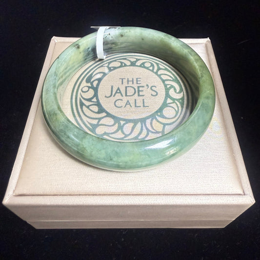 68. Green with natural black speckles jade bangle