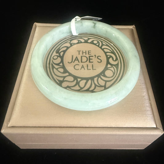 74. Light green with speckle of dark green jade bangle