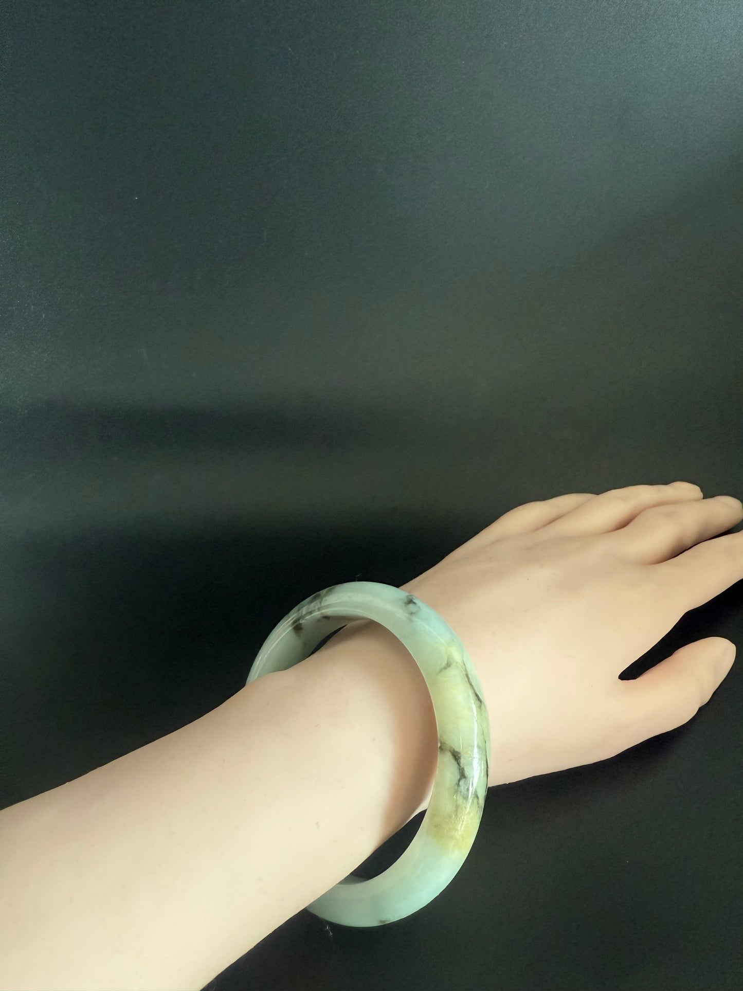90.  Light green with ink kissed patterns Jade bangle