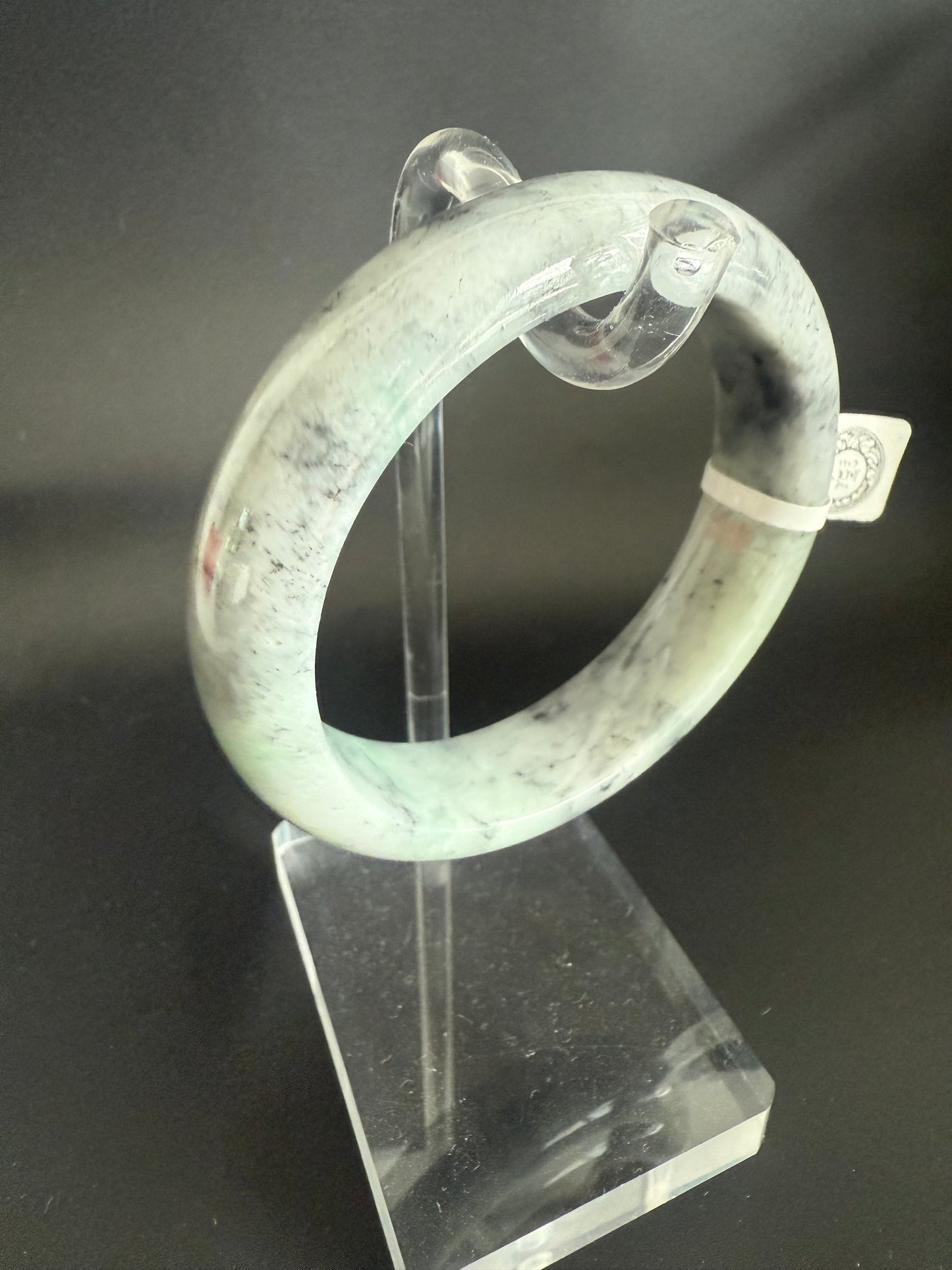 93. Greyish black with green Jade bangle