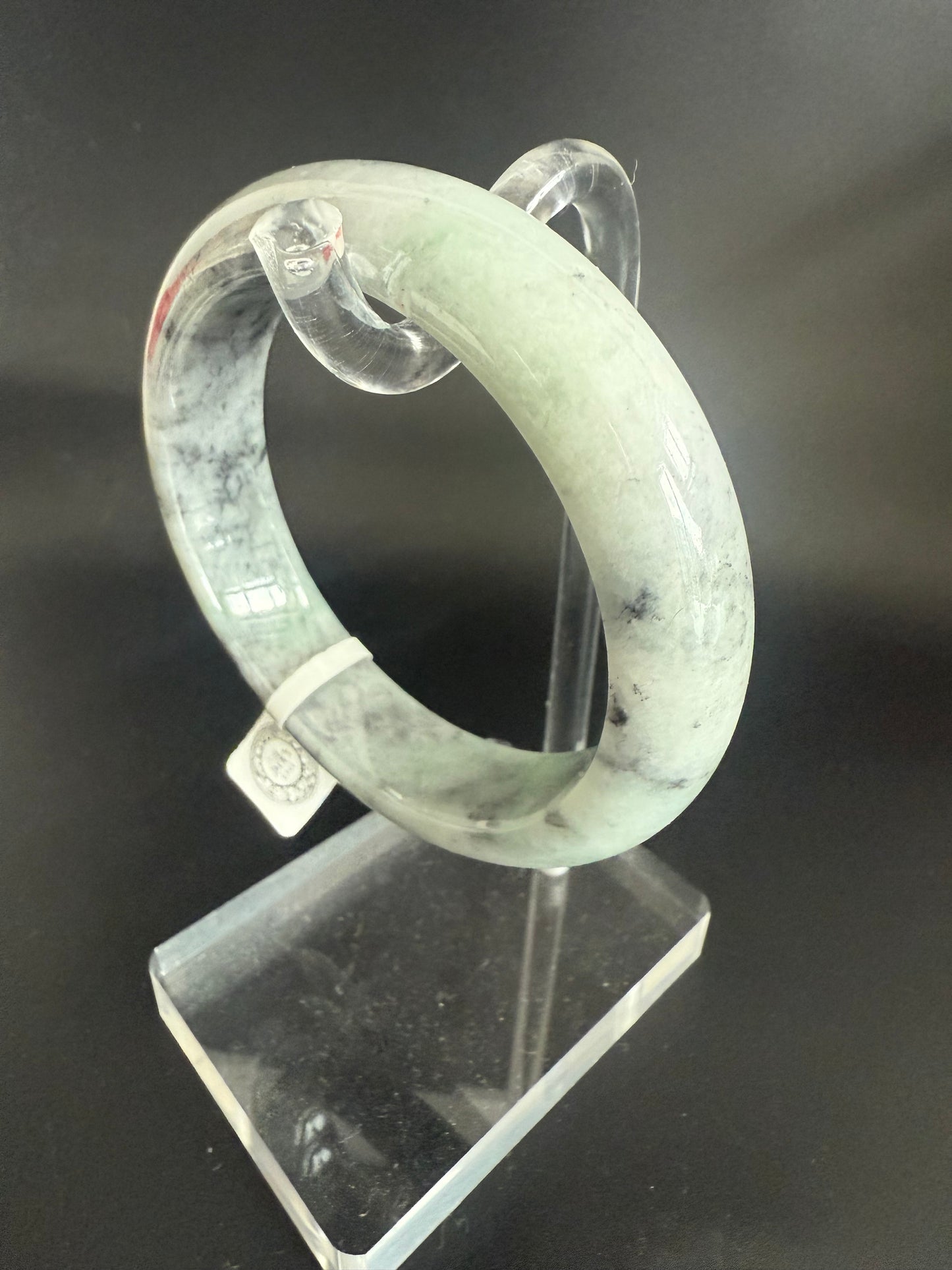 93. Greyish black with green Jade bangle