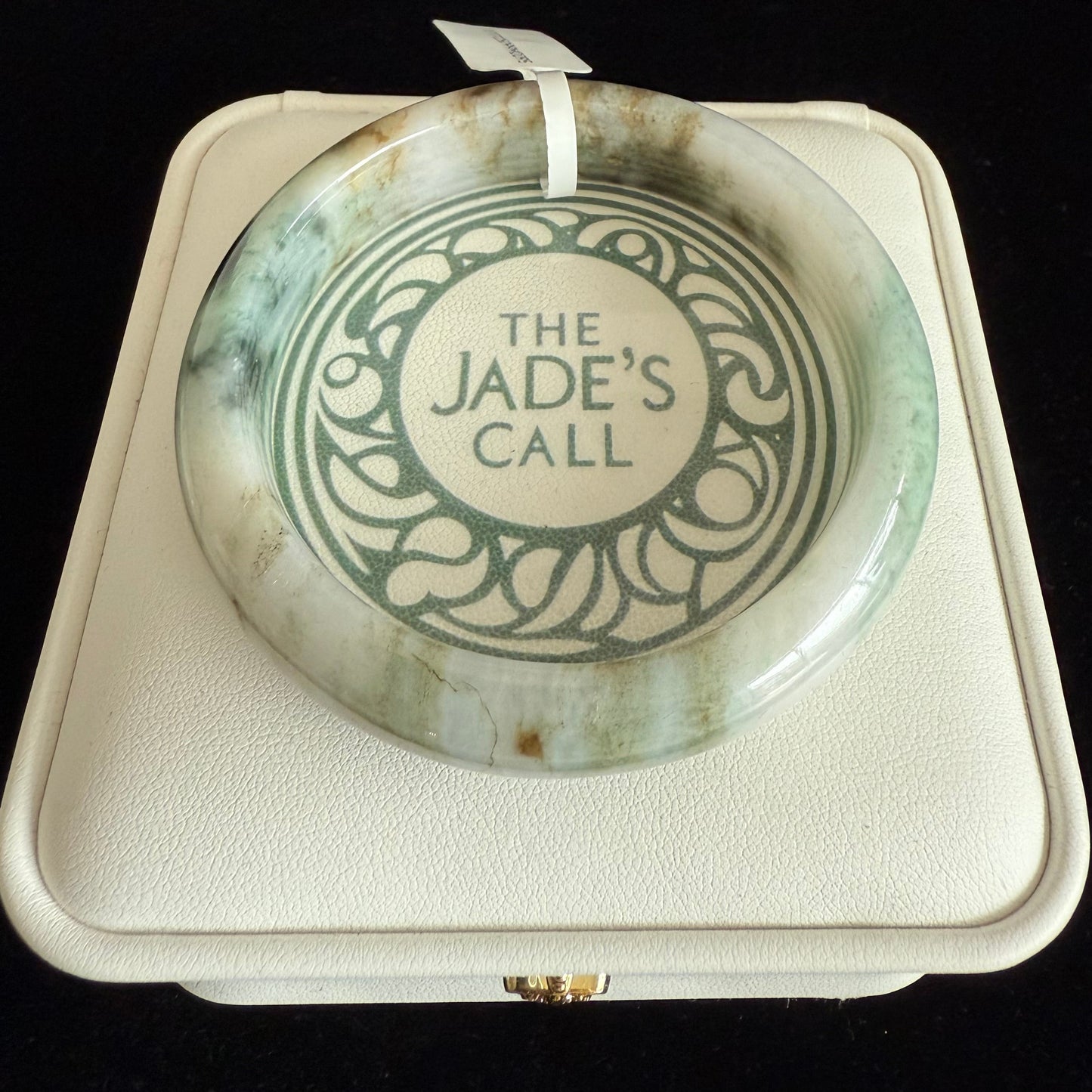 95. Hues of green and yellow brown color jade bangle.