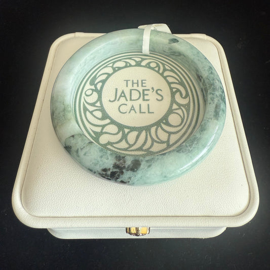 99. Light green with dark brown pattern Jade Bangle.