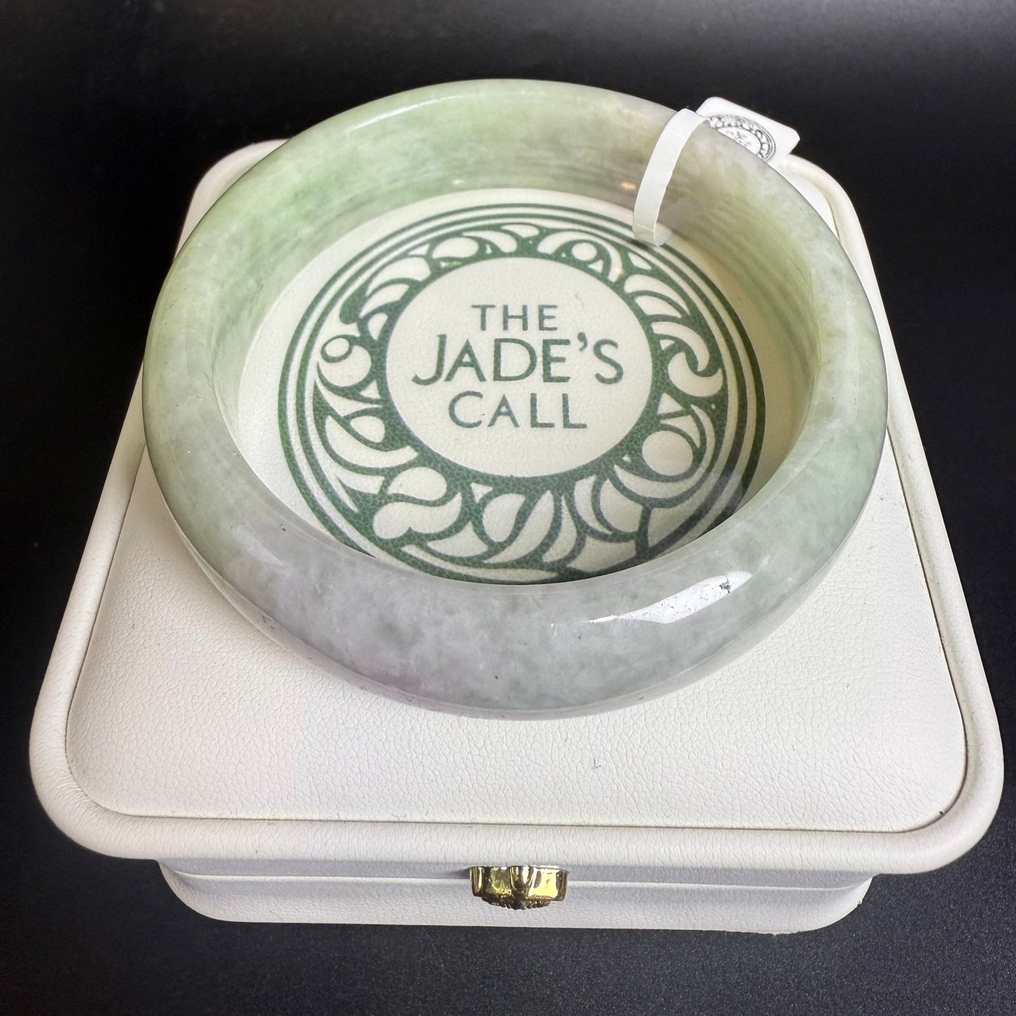 141. Light green with grey jade bangle