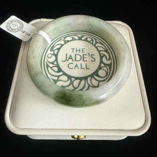 164 . Glossy tones with a splash of green Jade Bangle