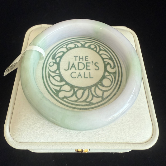 216. Clean looking light green Jade bangle