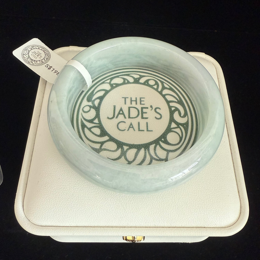 135. Uniform light green jade bangle