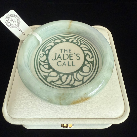 140.  Light green with a dash of gold jade bangle