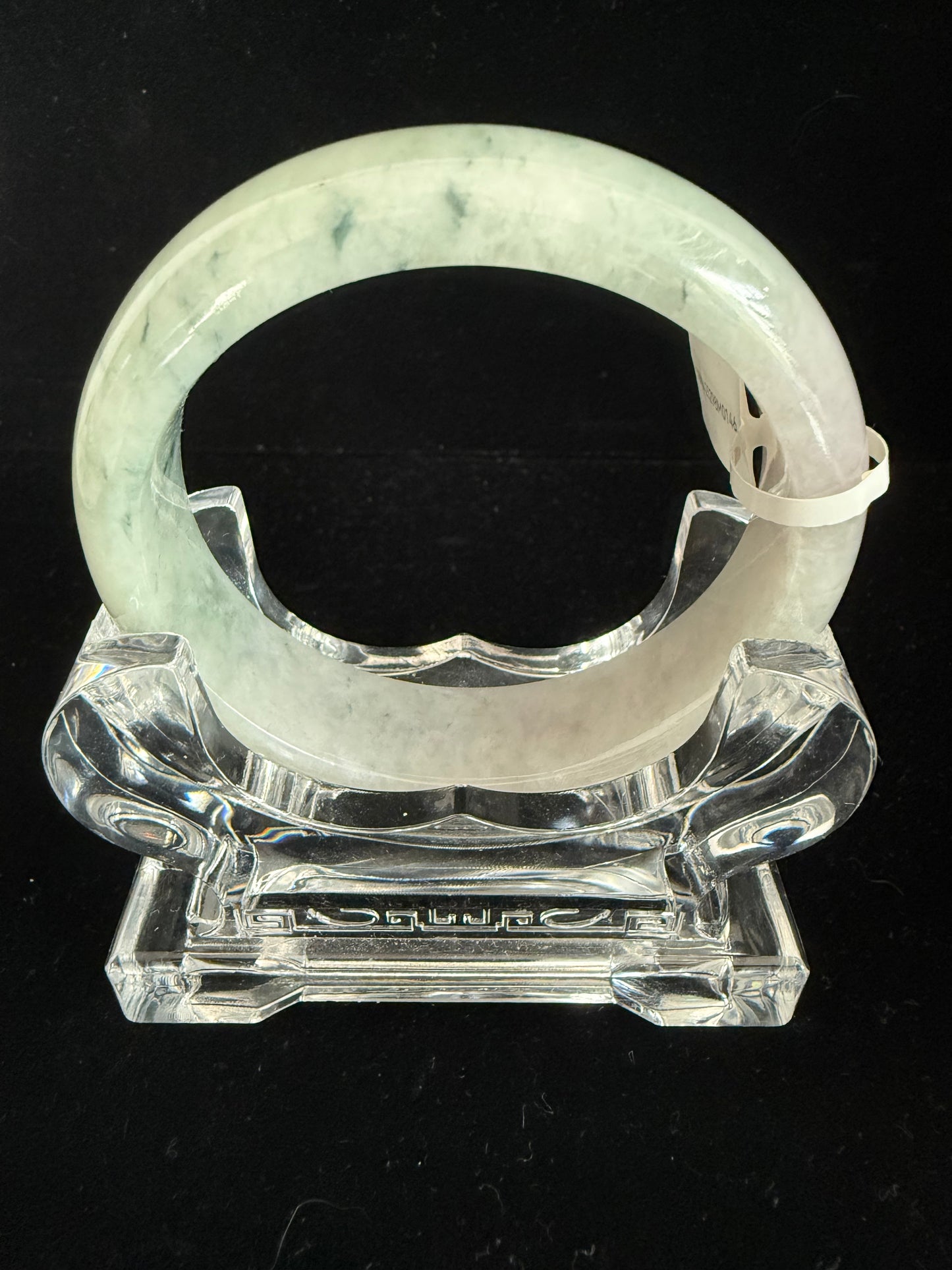 146. Floating green speckle jade bangle