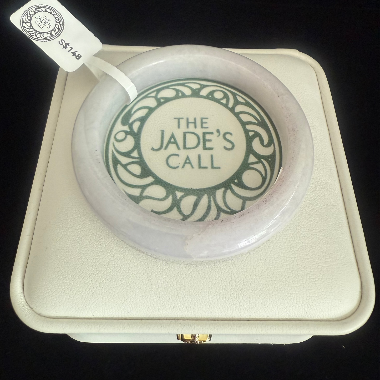 281. White with faint pink undertone jade bangle