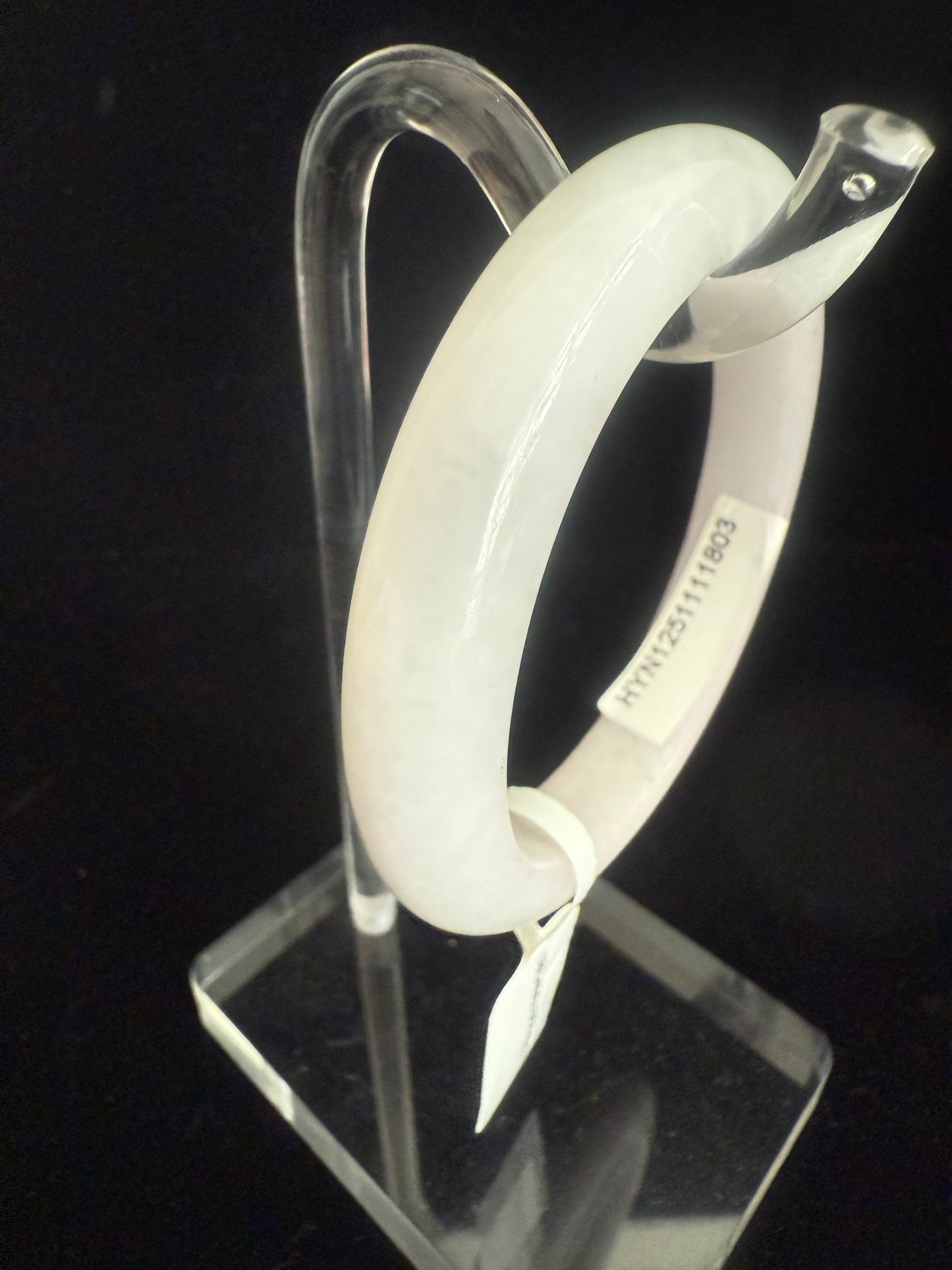281. White with faint pink undertone jade bangle