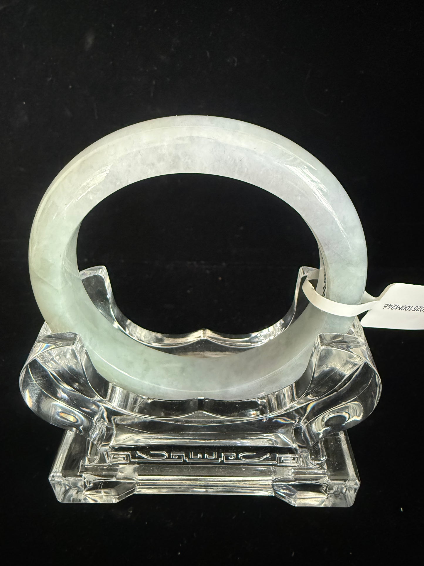 246.  Translucent green and grey Jade bangle