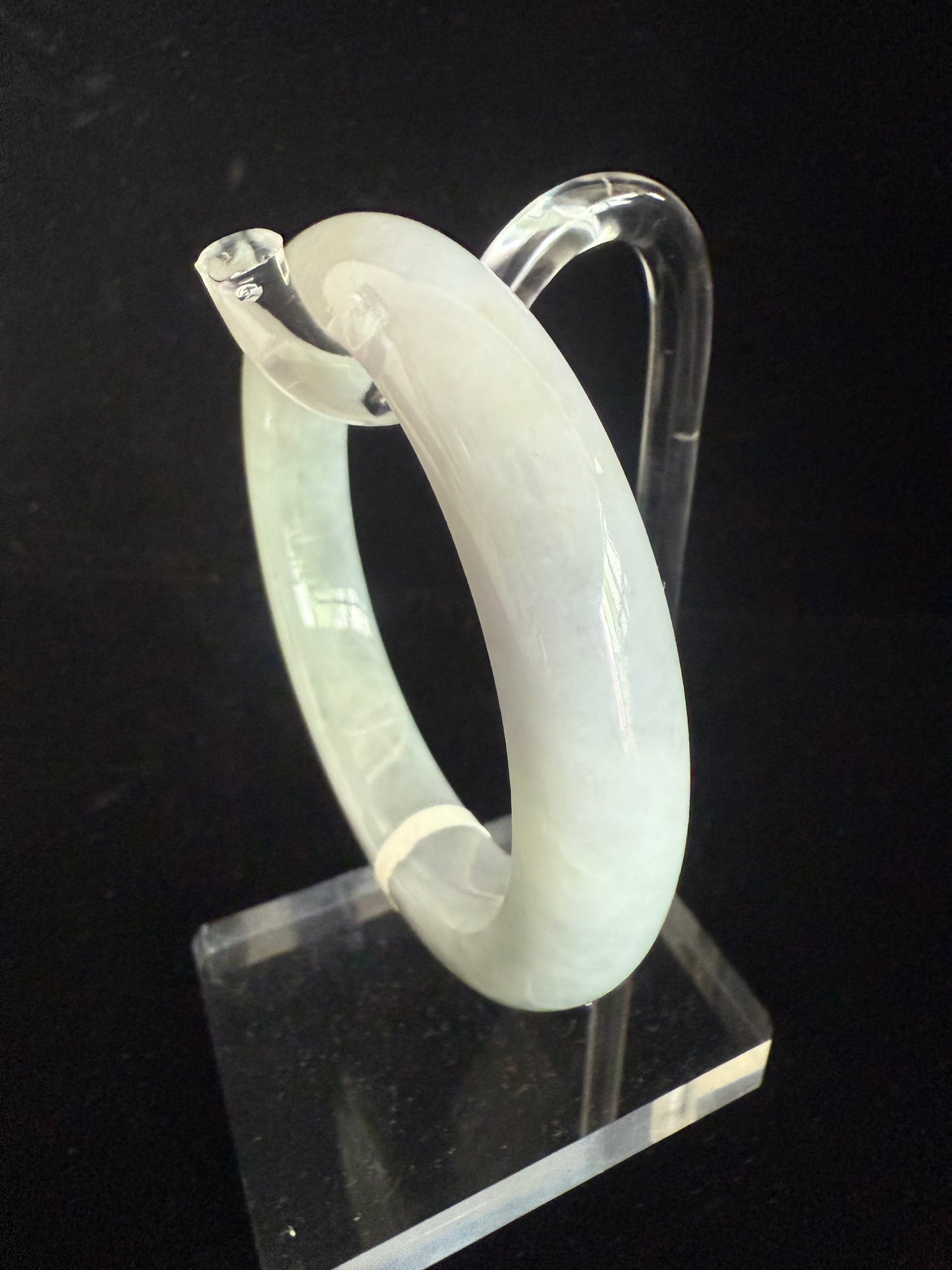 246.  Translucent green and grey Jade bangle