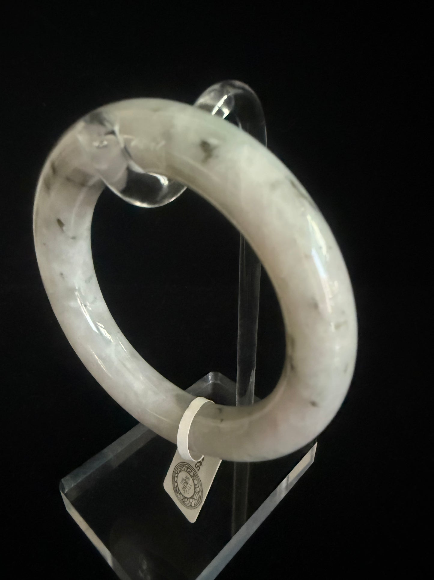 300. Traditional round floating flower motif Jade bangle