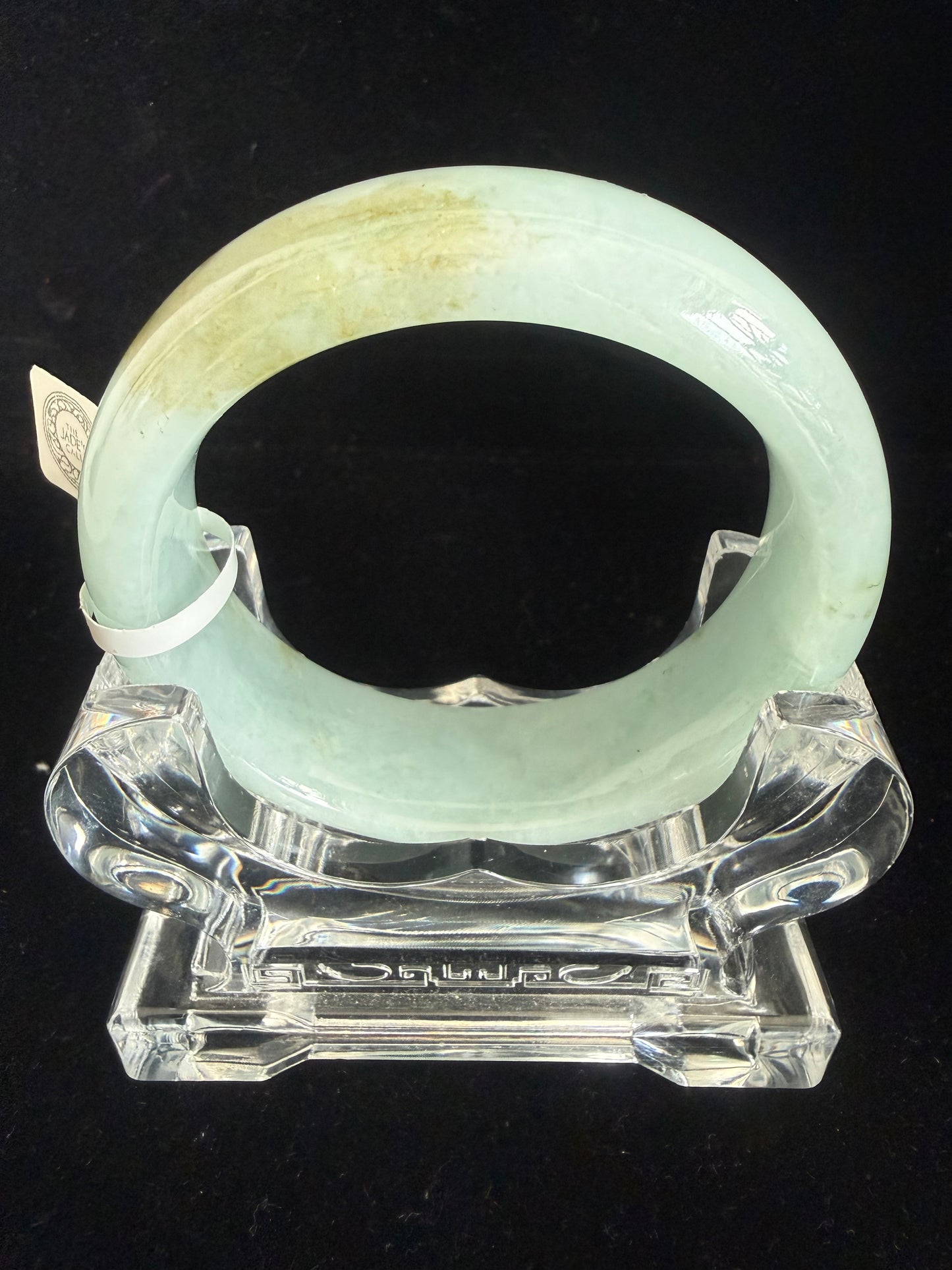 206. Broad lively green Jade bangle