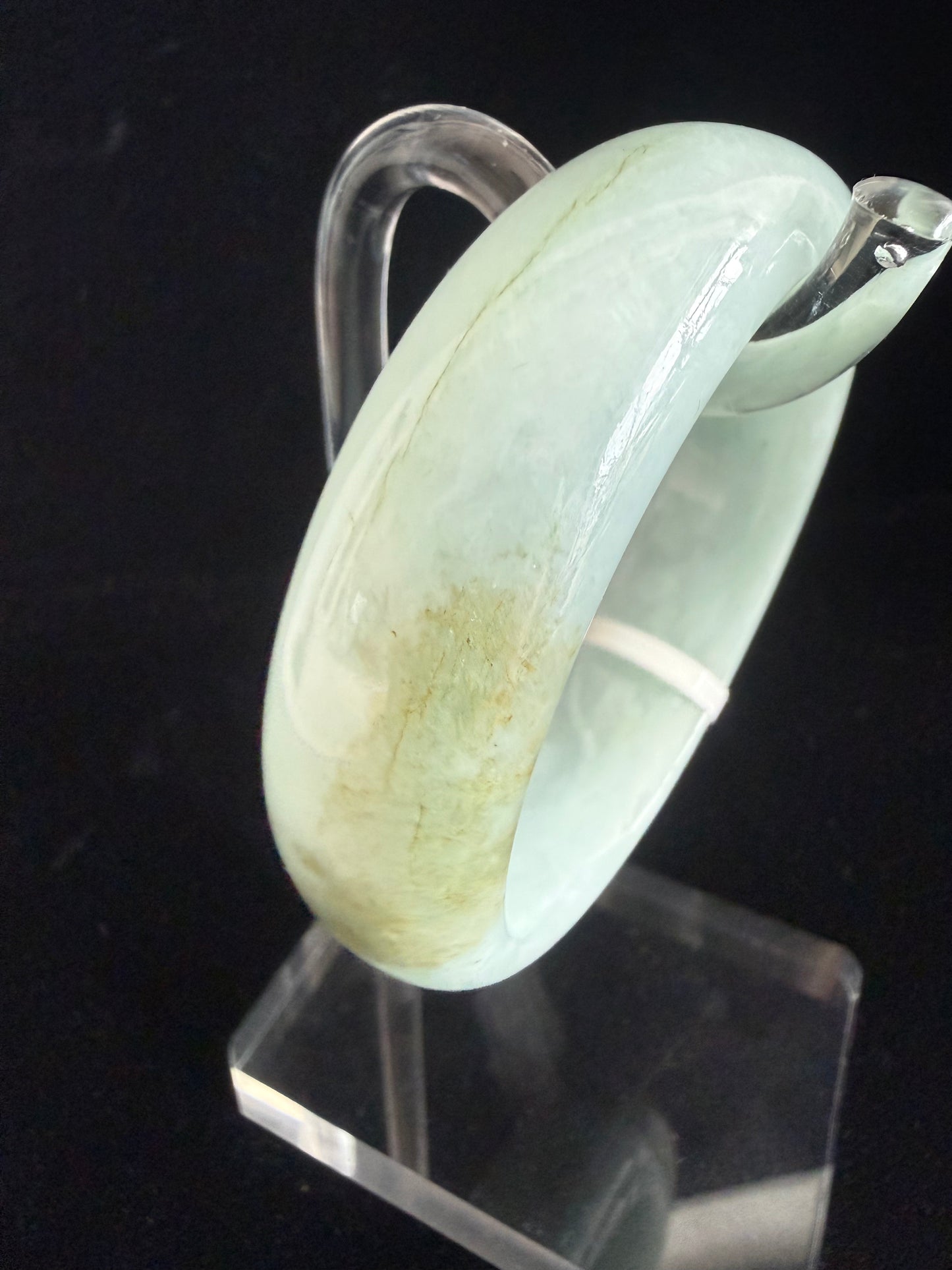 206. Broad lively green Jade bangle