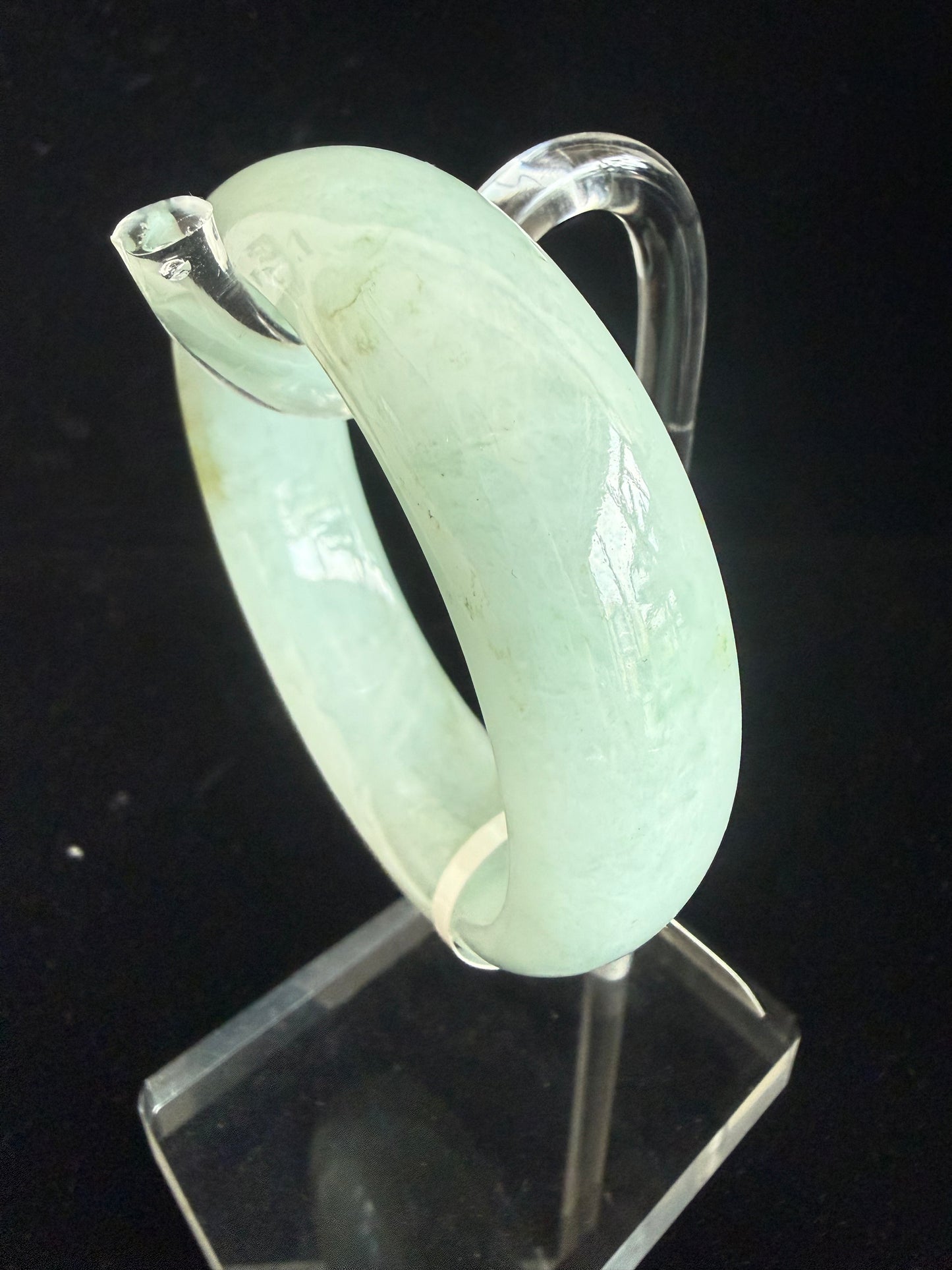 206. Broad lively green Jade bangle
